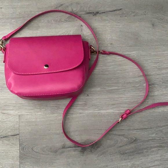 pink over the shoulder strap purse